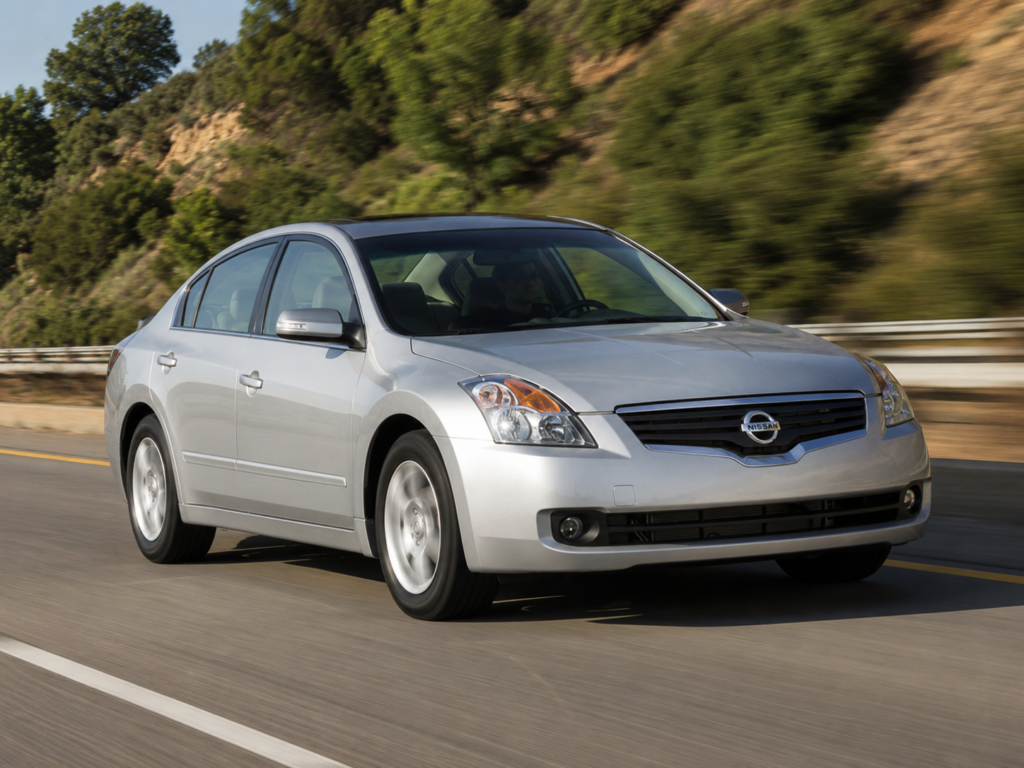 Nissan Altima sedan representing cheap used cars that need CVT transmission history checked.